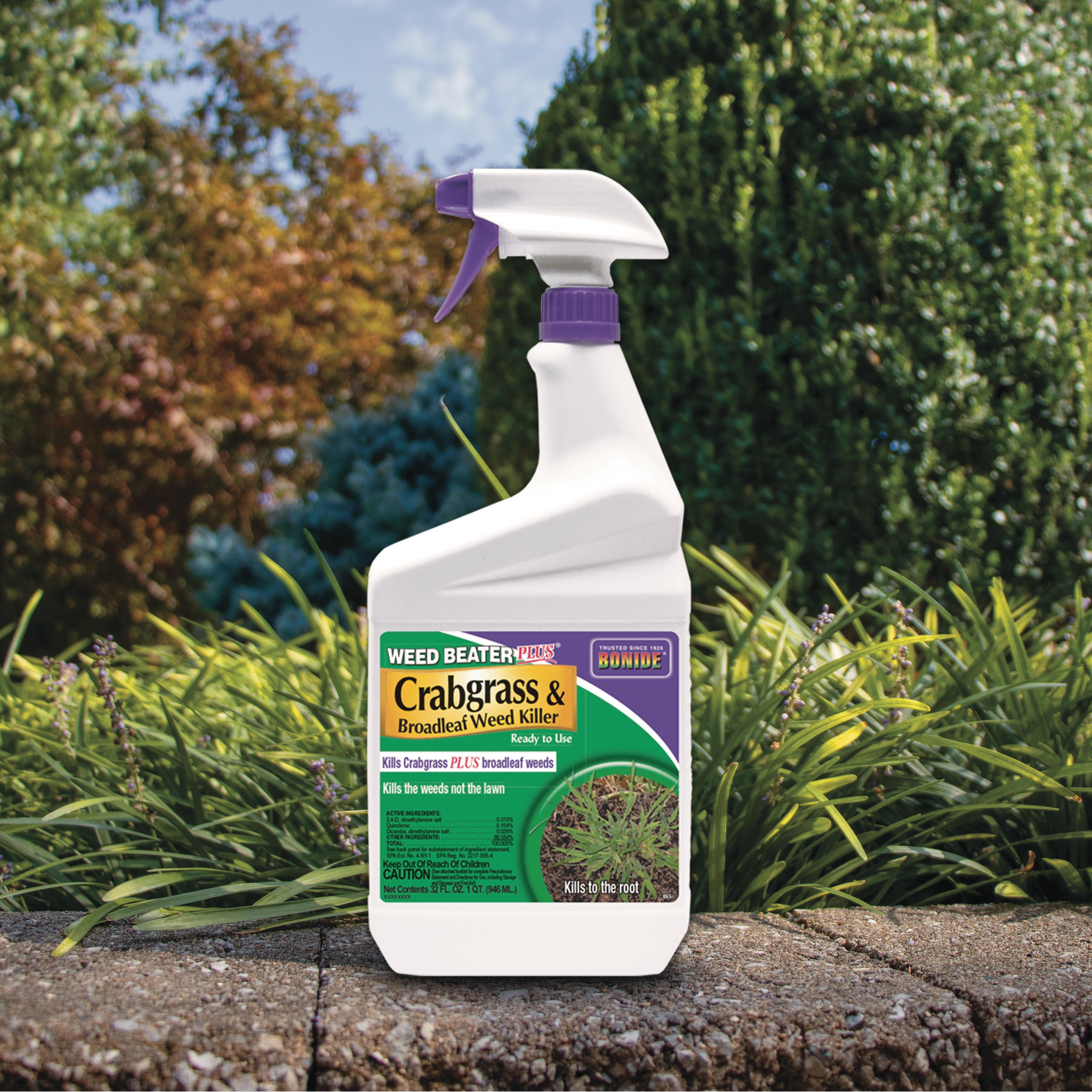 Ready-to-use weed killer spray bottle outdoors, targeting crabgrass and broadleaf weeds.
