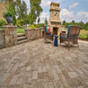 Venetian Square Antiqued pavers: 12x12, 60mm, creating a beautiful patio setting.
