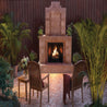 Outdoor brick fireplace with seating area, perfect for evening ambiance.
