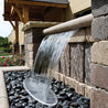 Stainless steel splash rings waterfall feature; sleek design with dark stones.

