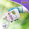 Pouring neem oil concentrate into measuring cup for garden pest control.
