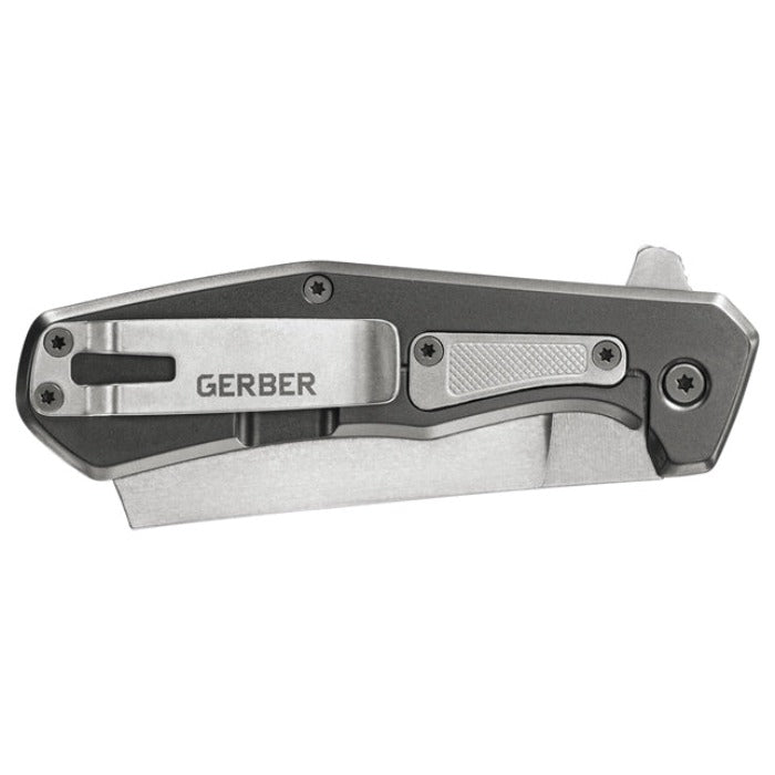 Gray and silver folding utility knife with textured handle detail.
