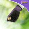 Hand in purple gardening glove holding mosquito dunks outdoors.
