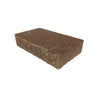 Brown rectangular capstone, rough-textured surface.
