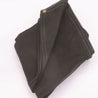 Black knitted truck tarp for heavy-duty protection.
