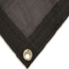 Close-up of black knitted truck tarp corner, showing reinforced stitching and brass grommet.
