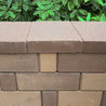 4" Rectangle Concrete Cap, brown and beige, for retaining walls and landscaping.

