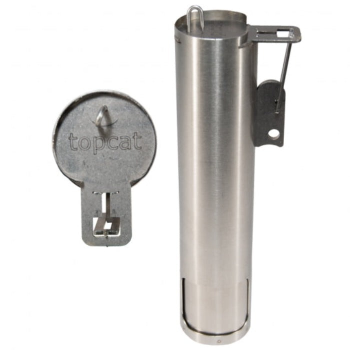 Stainless steel mole trap with a hinged access door, shown with its access key.
