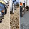 Cars and trucks parked on a gravel surface stabilized with grid paving.
